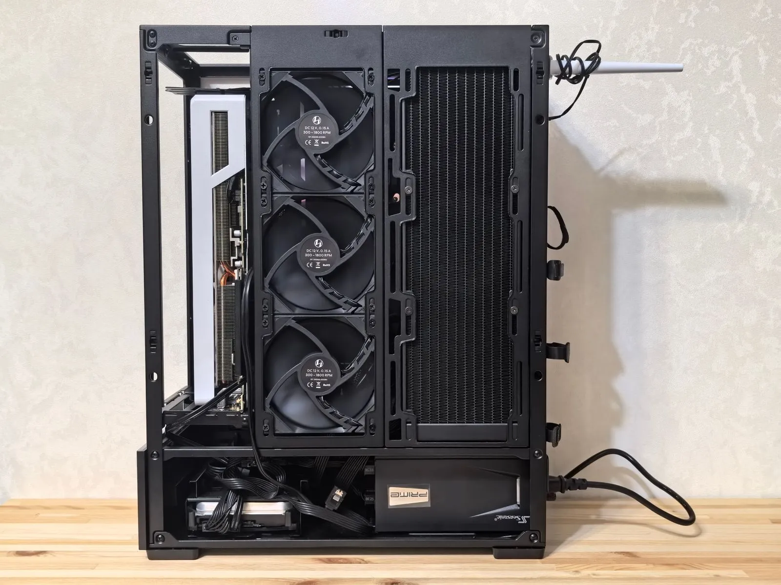 High-resolution image of a custom-built desktop computer with visible cooling system.